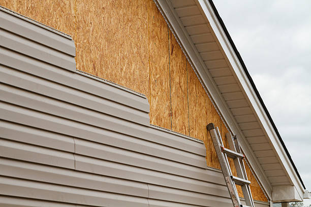 Professional Siding Installation technician working in South Fork, PA